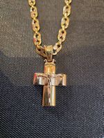 Chaîne en or 18 carats avec croix