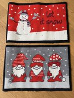 Zwei weihnachtliche Türmatten