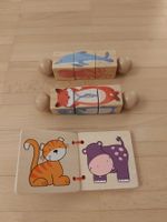 Holz Spielzeug und Buch mit Tieren