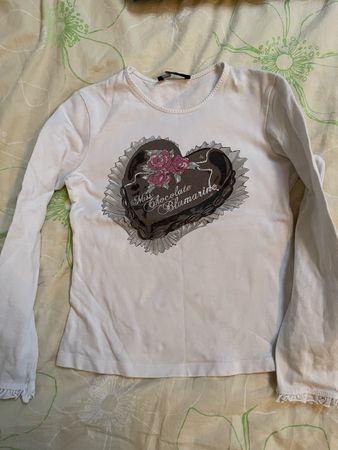 Pull fille taille 7 ans