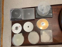 Lot de 40+ CD/DVD réinscriptibles vierges et leurs boîtiers