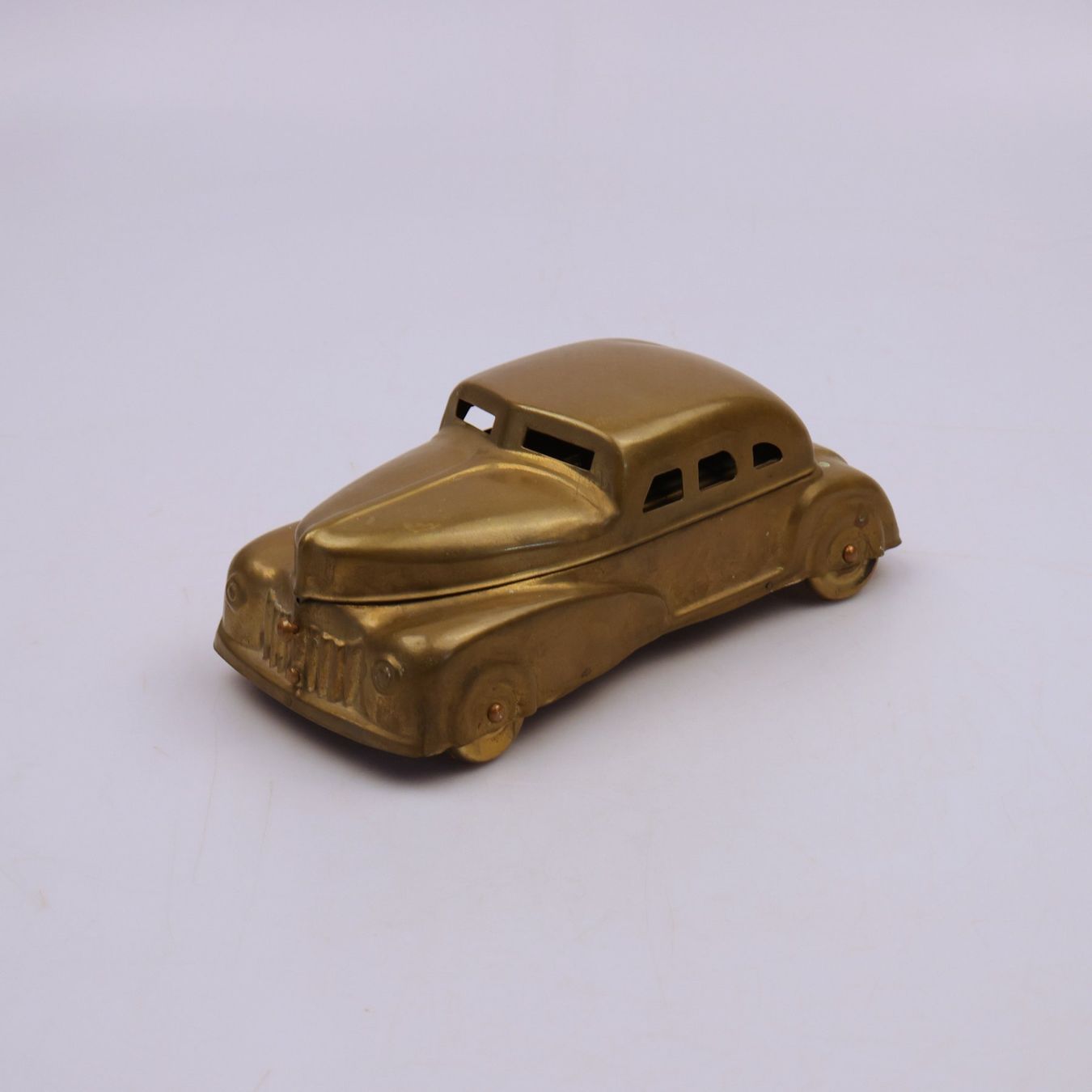 Statuette: Betel-Motor-Auto aus Messing – Usato da Volketswil venduto da brockipfannenstil