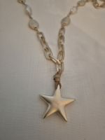 Star necklace. Gold and pearl.