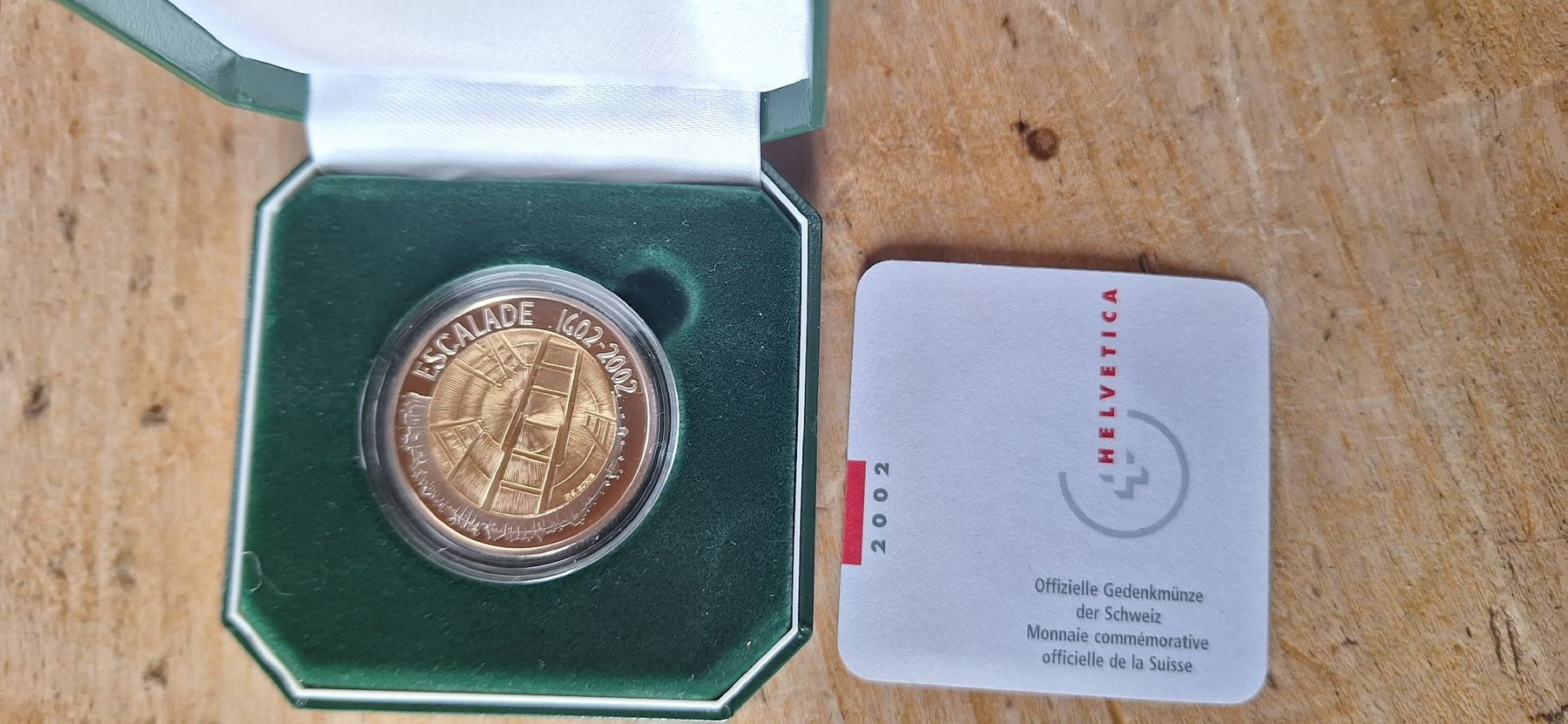 Tutti le monete: Pièce commémorative suisse Escalade 5 fr. 2002 – Nuovo e nell'imballaggio originale da Le Sentier venduto da Loorenz
