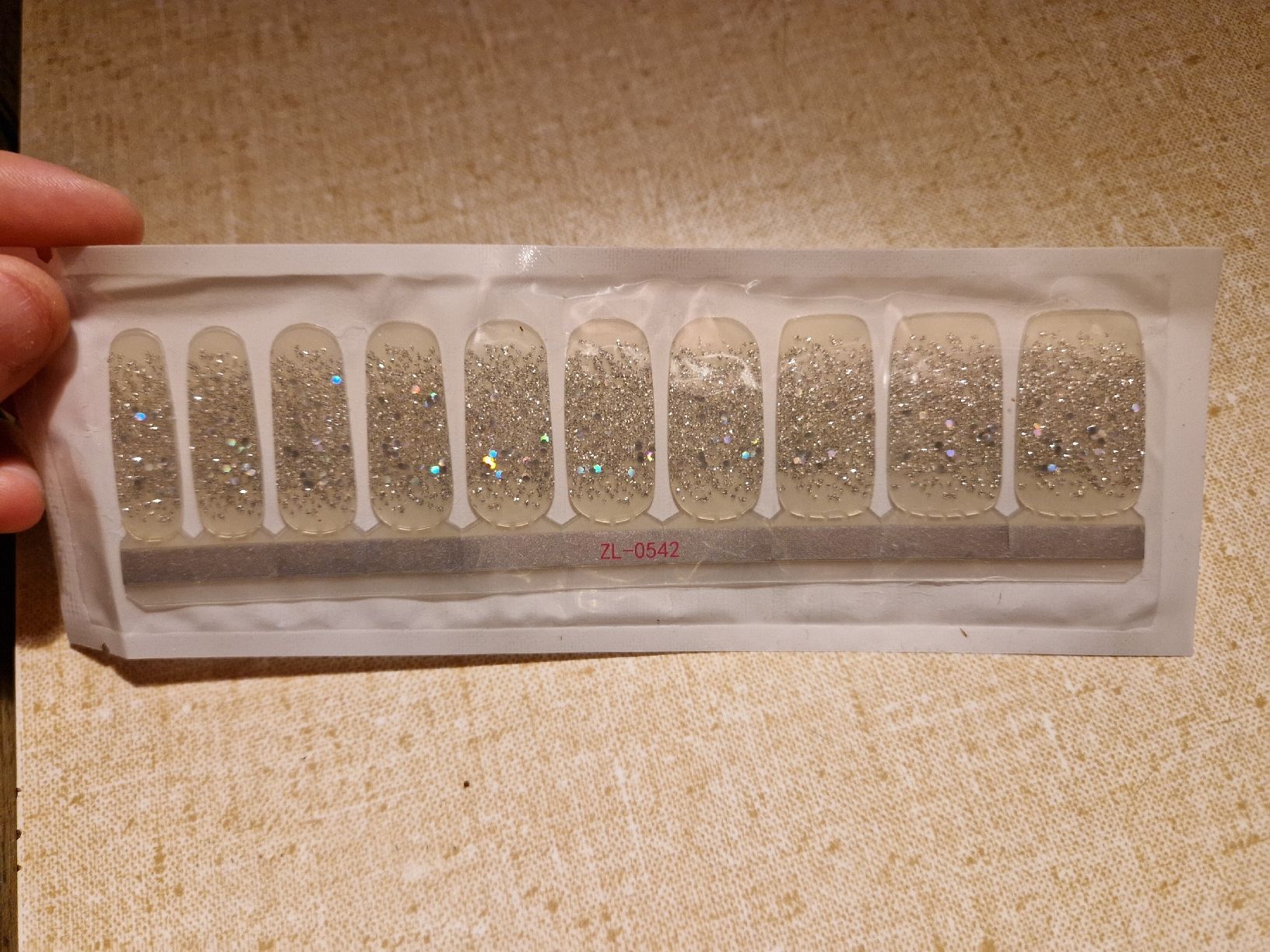 Unghie finte: Nagelfolie silberglitzernd – Nuovo e nell'imballaggio originale da Luthern venduto da Ricolinchen