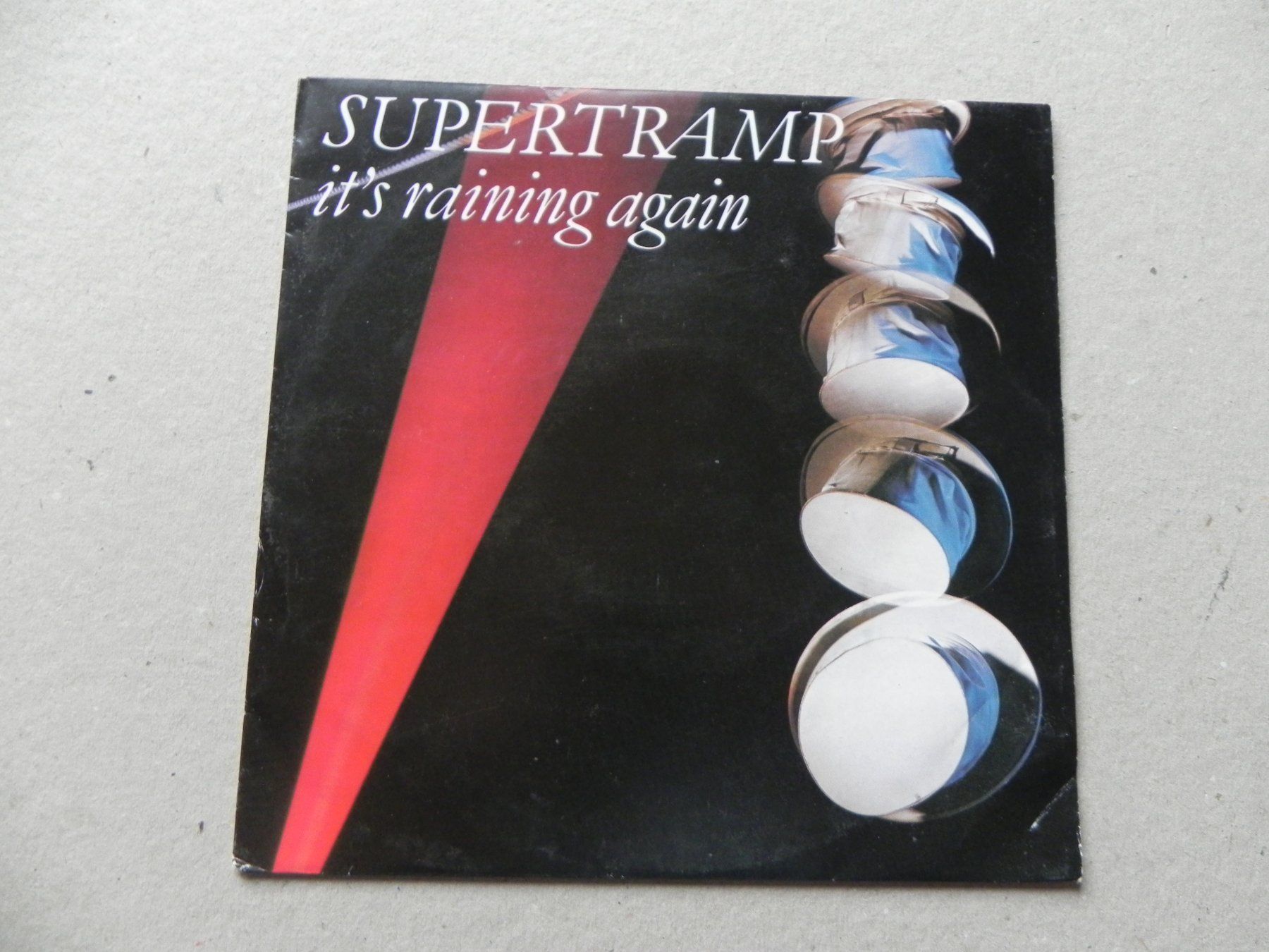 Dischi in vinile: Single 7 " Brit. Rock Pop Band Supertramp 1982 It`s raining – Usato da Siebnen venduto da krimsie