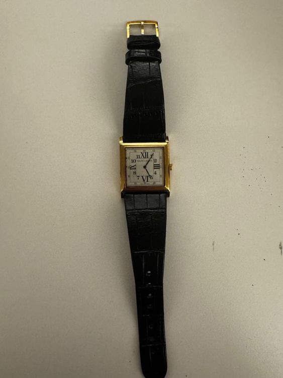 Une montre en or rose de marque Ralph Lauren 1