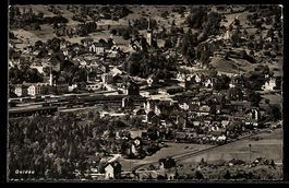 AK Goldau, Ortsansicht mit Kirche und Bahnhof