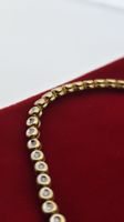 Exklusives Tennisarmband 750 / 18K Gelbgold mit Brillanten