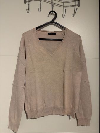 Getragener Pullover