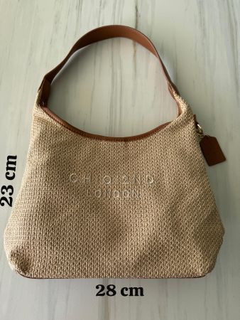 Braune Handtasche aus Stoff mit Lederelementen