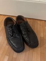 Schwarze Schuhe Grösse 42
