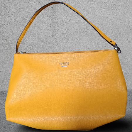 Guess Sac à main jaune  en bon état pour l'été ☀️