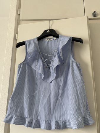 Haut NAF NAF rayé bleu blanc taille 34 sans manches volants