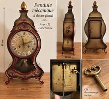Pendule mécanique ancienne à décor floral 
