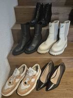 Verschiedene Damenschuhe: Stiefel, Sneaker & Pumps 40