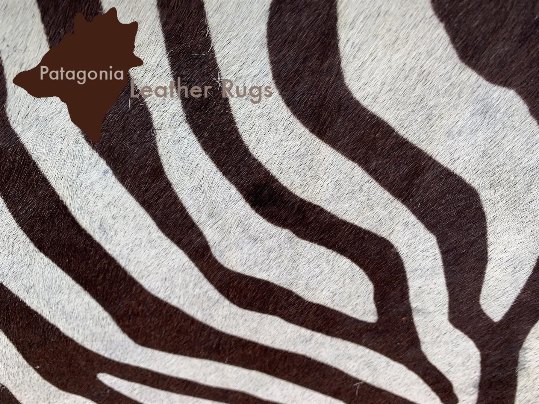Sgabelli: Kuhfell Hocker Zebra – Nuovo e nell'imballaggio originale da Arbedo venduto da patagonialeatherrugs 3