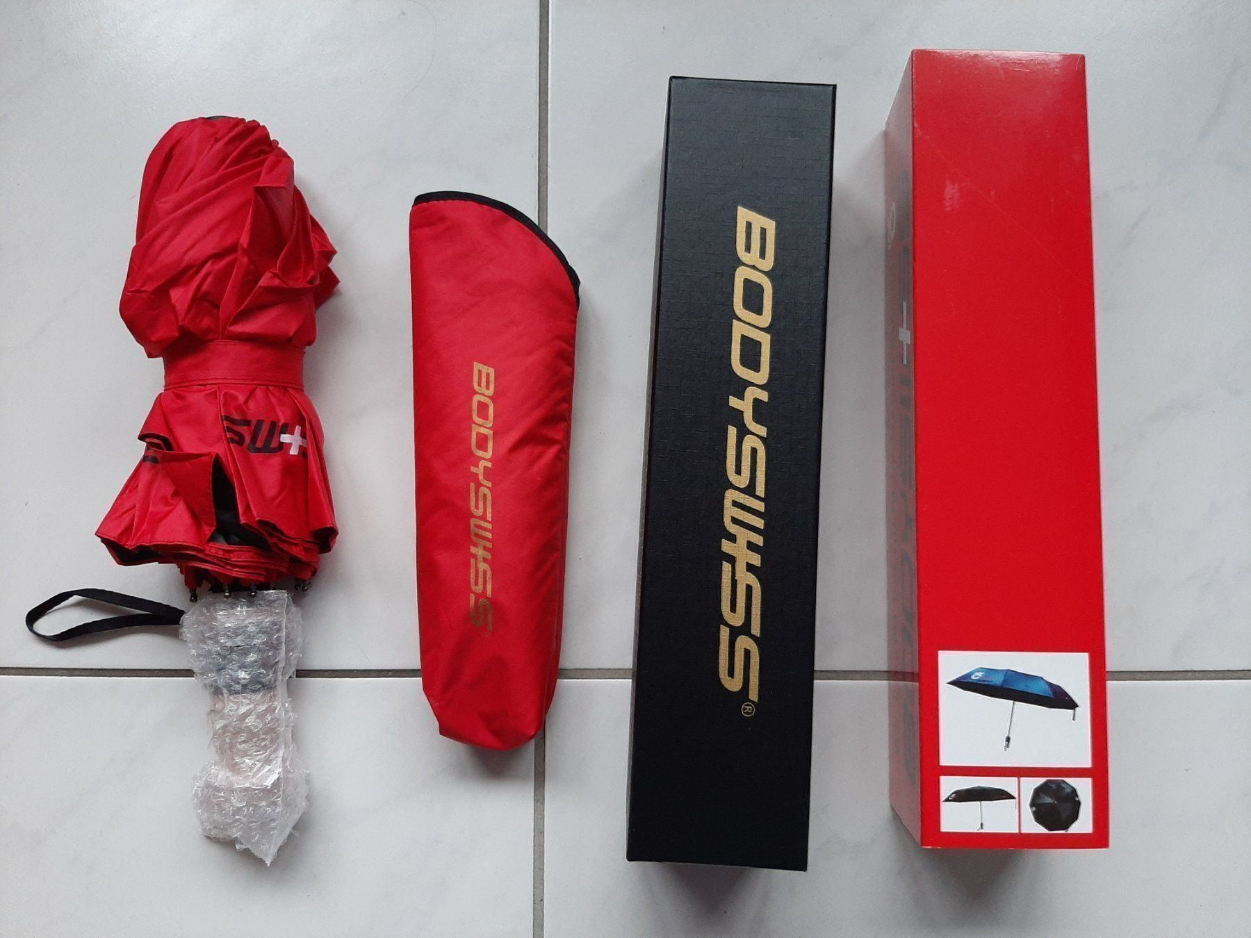 Regenschirme: Schöner, spezieller Regenschirm – Neu und originalverpackt aus Nottwil von Janny77