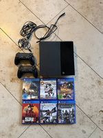 Playstation 4 mit Controller und Games