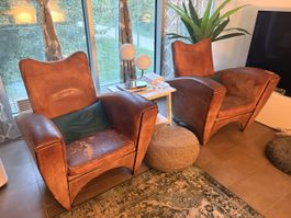 set of 2 vintage-style leather armchairs in warm brown