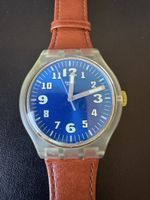 Swatch Armbanduhr blaues Zifferblatt braunes Lederband