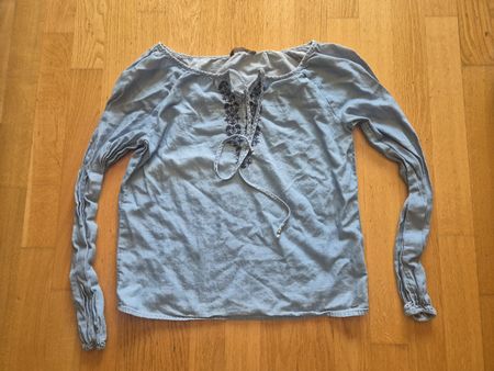 Light blue blouse, embroidered, perfect for autumn season