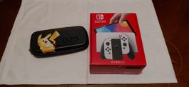 Switch Oled inklusive Spiele und Etui OVP