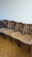 4-teiliges Set aus Holz- und Ledersesseln