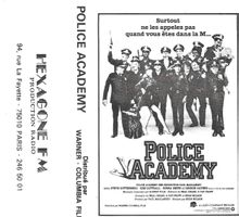 POLICE ACADEMY  ( CASSSETTE AUDIO )