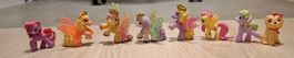 7 Pony Figuren und ein Hund, guter Zustand