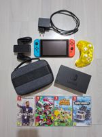 Nintendo Switch + 4 jeux, une manette...