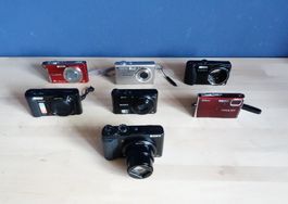 Lot de 8 appareils photo avec accessoires