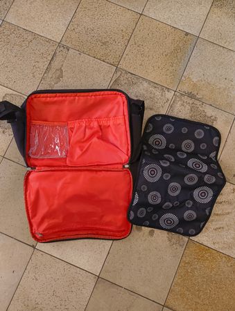 Schwarze Wickeltasche, fast neu