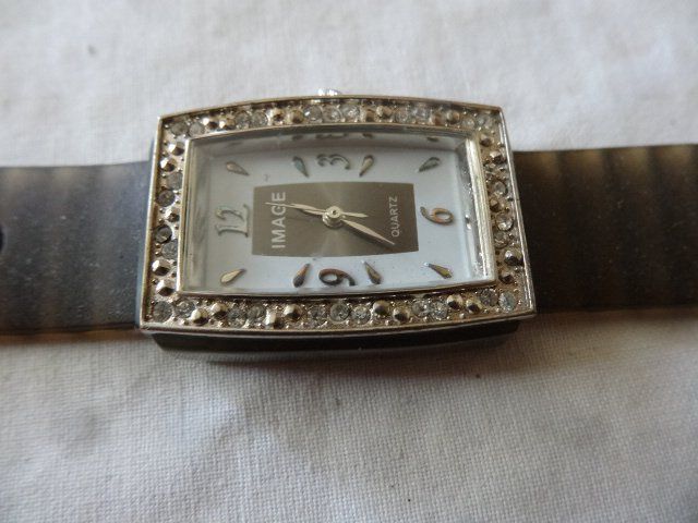 Uhren: IMAGE  HEREN UHR.QUARTZ..LÄÜFT--24X33MM – Gebraucht aus zürich von ahmad01