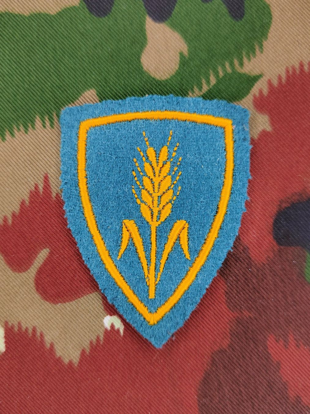 Schweizer Armee Uniformen: Funktionsabzeichen Quartiermeister Ord. 1949, Variante 5 – Gebraucht aus Bauma von SwissMilitaria