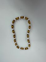 Armband goldig-weiss
