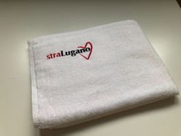 Serviette blanche avec logo Groupe Mutuel neuve