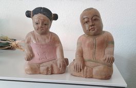 asiatisches Paar aus Holz