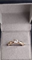GIA-certified solitaire diamond ring in excellent condition