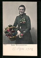 Basel, Basler Blumenmädchen mit Korb vo