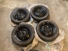 4 jantes en tôle 14" avec pneus Falken 155/65 R14 75S