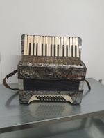 accordéon hohner à piano 