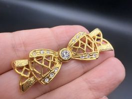 Vintage-Brosche in Form einer goldenen Schleife mit Strass