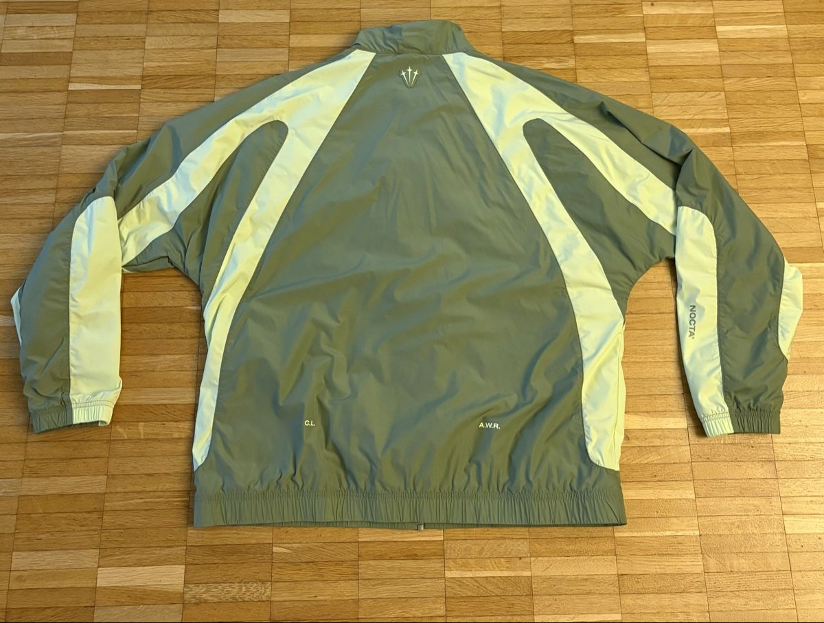 Nike Vestes: NIKE NOCTA NYLON TRACKJACKET – Neuf (Voir description) à Adliswil par zuerichloulii 1