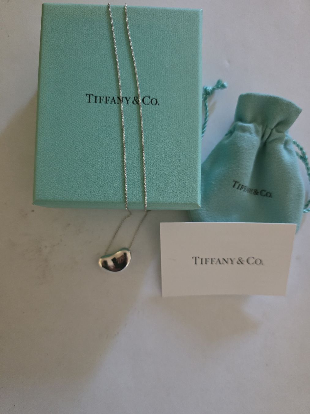 Tiffany & Co. Ciondoli: Tiffany &Co. 925 Silber Bean Kette NP 730 – Usato da Binningen venduto da lieblingsstyle