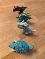 4 süsse Dino-Figuren aus Plastik, gebraucht