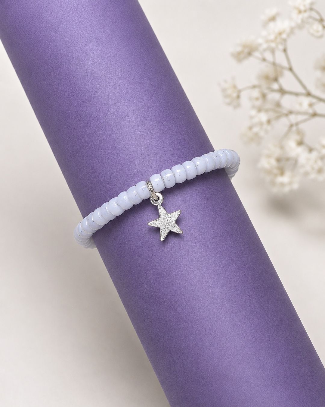 Bracciali & Braccialetti: Kinderarmband aus Chalcedon mit Sternanhänger – Nuovo e nell'imballaggio originale da Schindellegi venduto da MoonAmber.schmuck