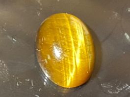 Goldener Tigerauge Cabochon geschliffen /8,35ct