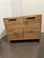 Meuble sous-lavabo bois clair deux portes tres bon état