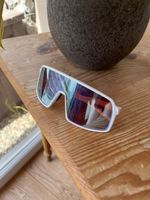 Lunettes de soleil Oakley, monture blanche